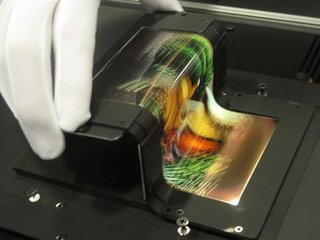 ������ʾ�봥��չ9�µǳ� OLED������Ŀ